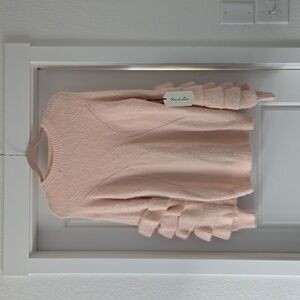 Oversized pink ruffle sweater